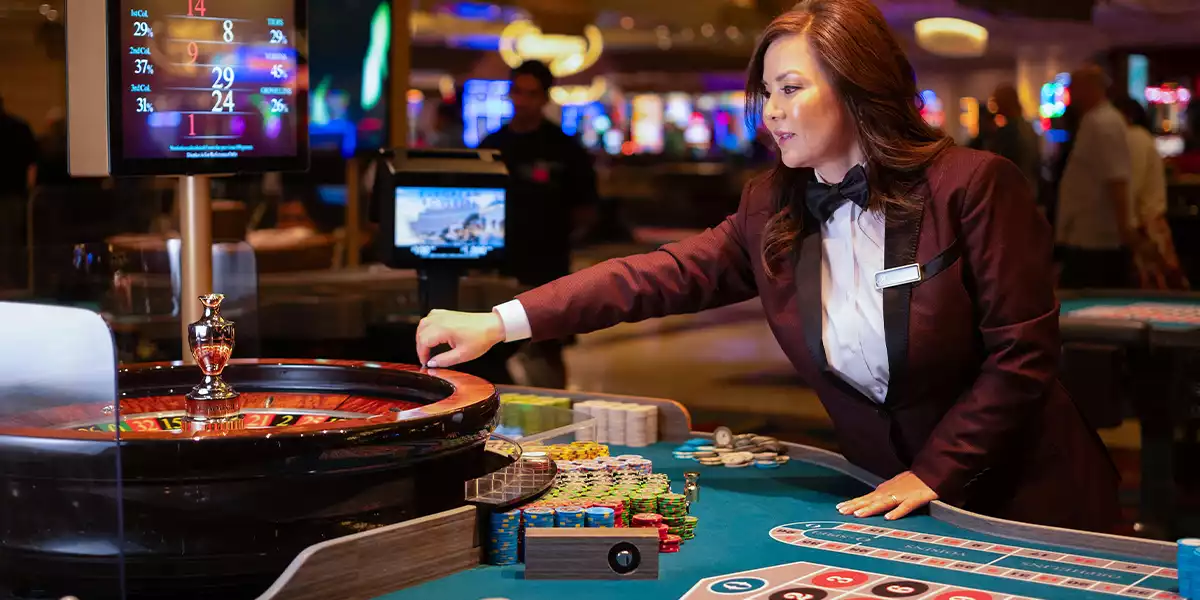 A-croupier-at-a-European-roulette-table-in-a-physical-casino