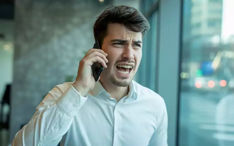A-person-shouting-into-a-phone