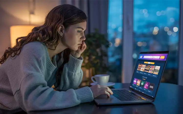 A-person-sitting-at-a-laptop