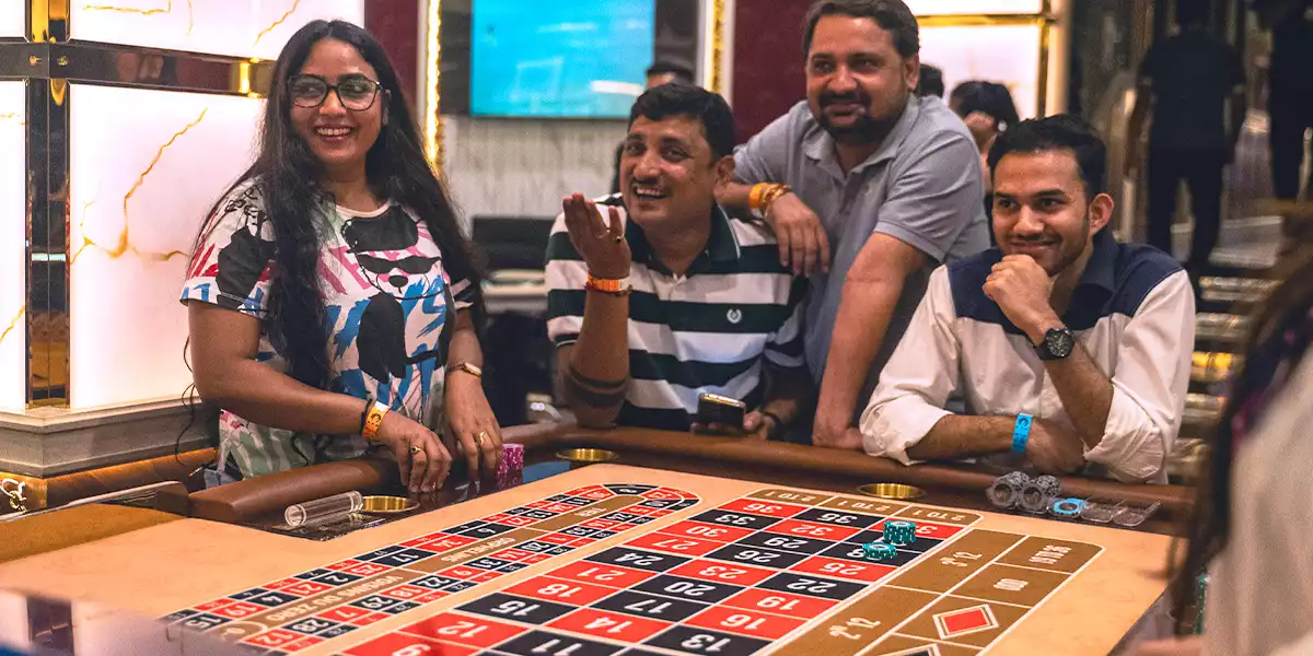 Players-sitting-standing-at-roulette-table-in-a-casino