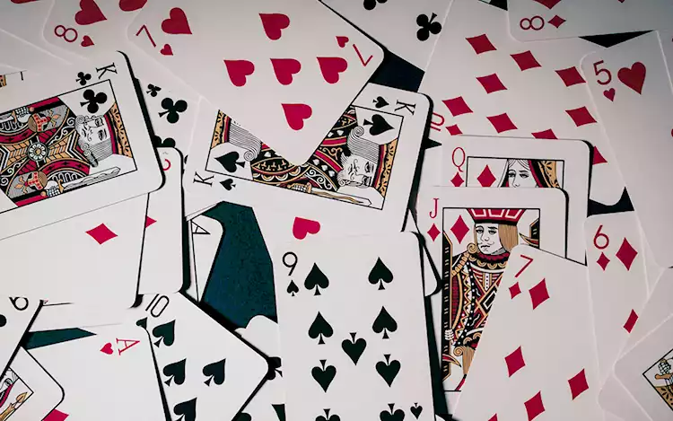 group of cards scattered on the table