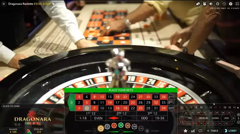 dragonara live roulette gameplay with dealer and players seen in the background