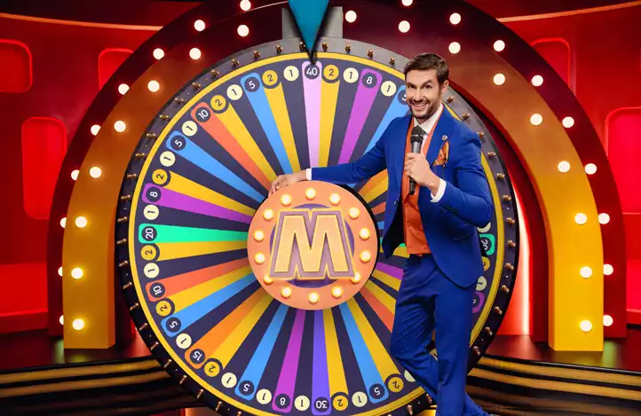 mega wheel banner with male host