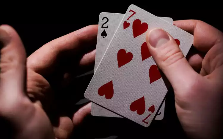 player holding cards