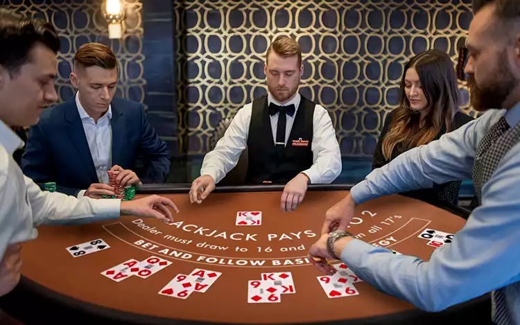 players at a blackjack table