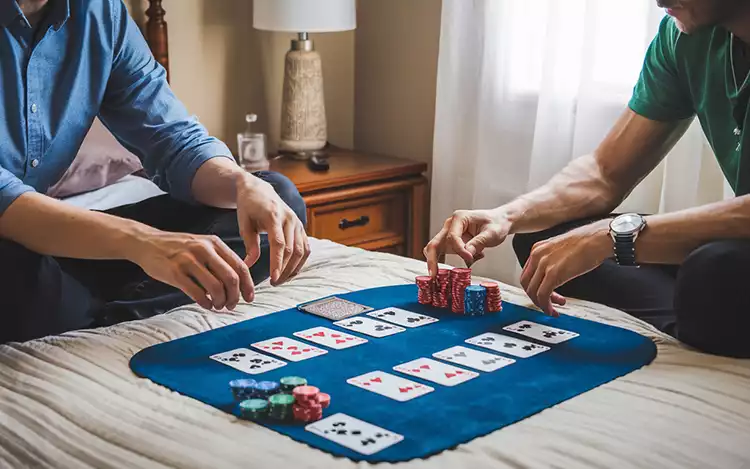 playing blackjack on bed