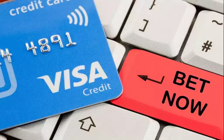 VISA Betting showing a visa credit card on a keyboard