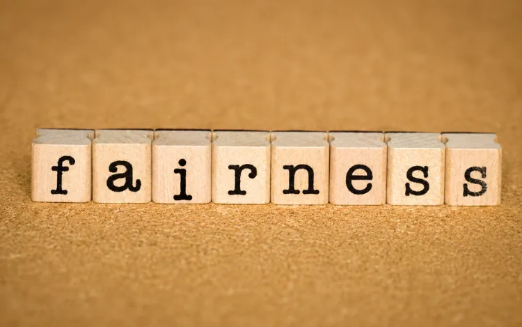 Why Small Delays Help Maintain Fairness