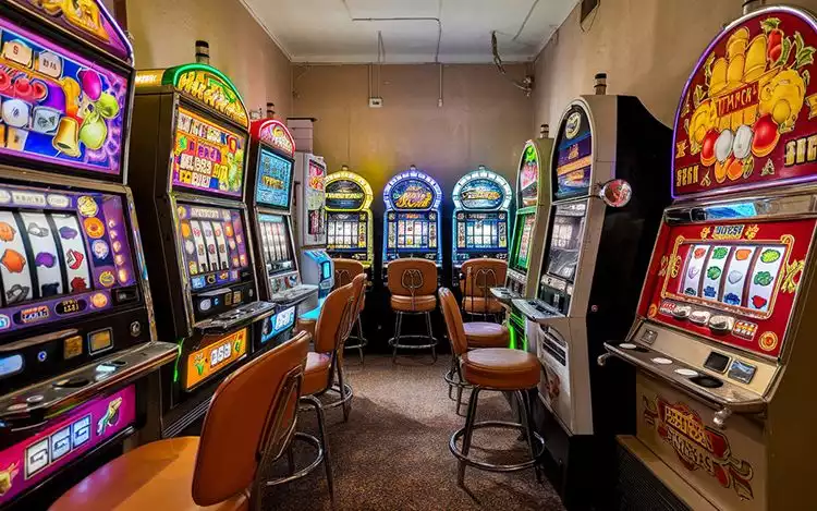 vibrant row of slot machines in casino