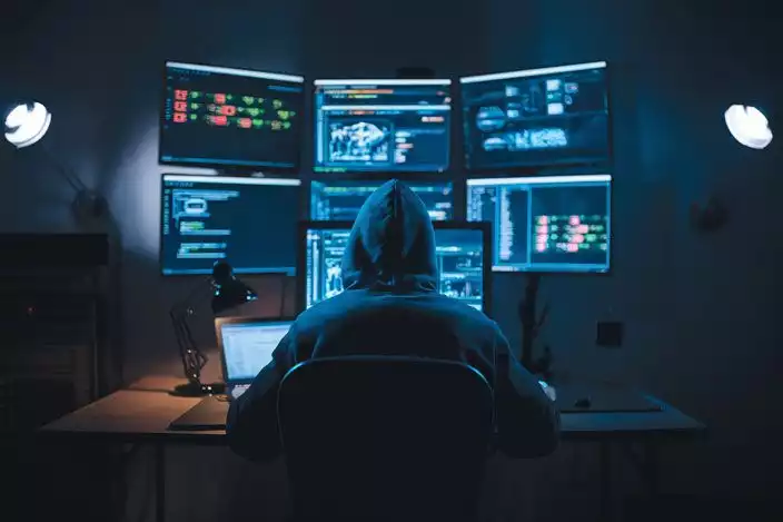 hacker in dark room