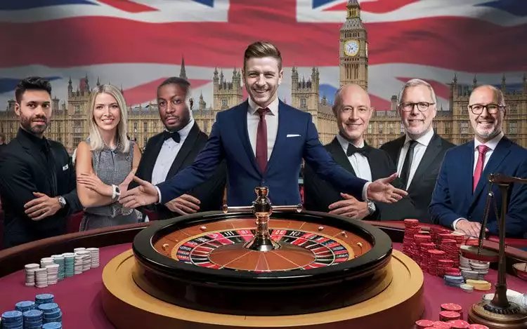 casino dealers and a roulette wheel
