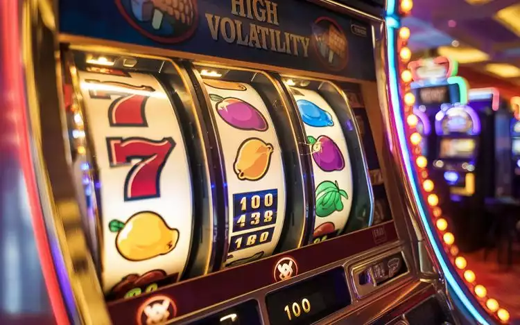 Some wild symbols like fruity icons are displayed on a slot machine.