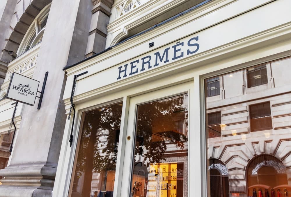 Hermes shop front with a reflection of the street on the windows