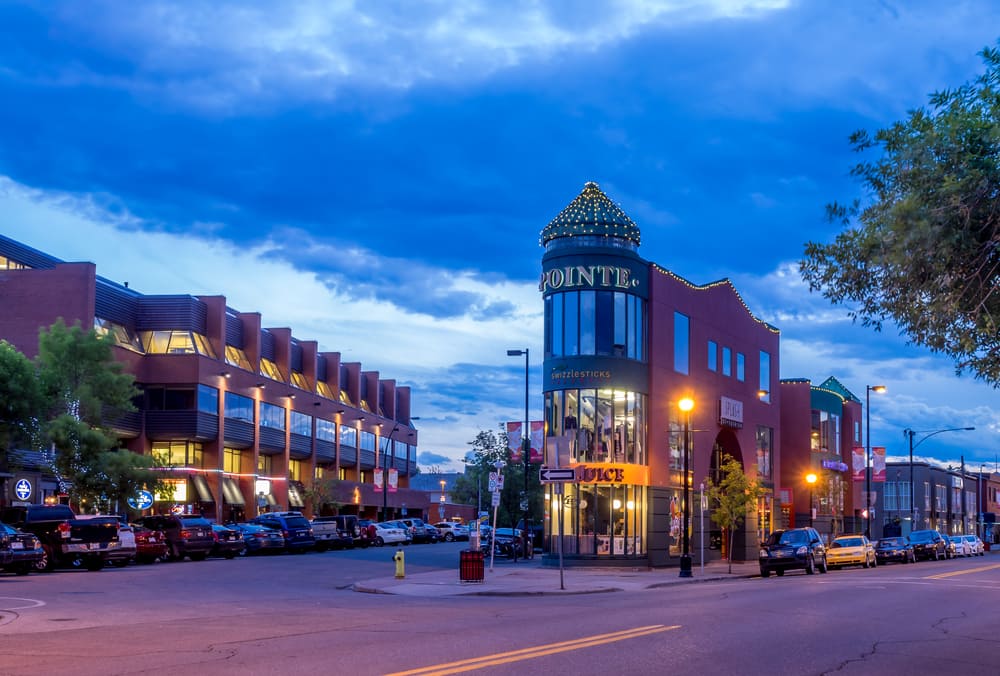 Buildings and road in Kensington during the evening