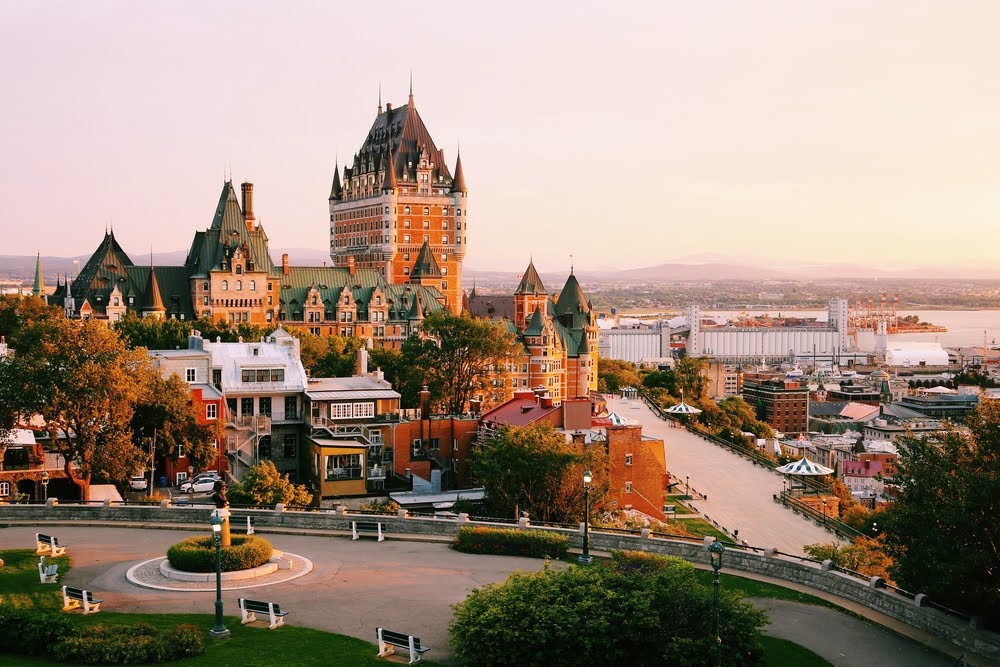 View of Frontenac Castle with sunrise in the background