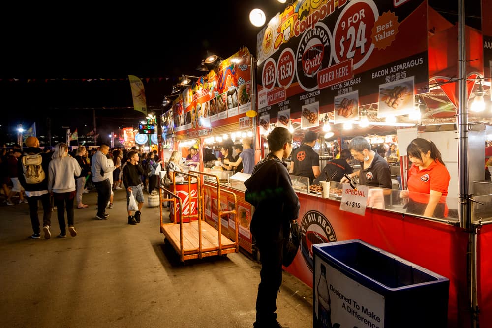 Visitors at the Richmond Night Market ordering food from a stall
