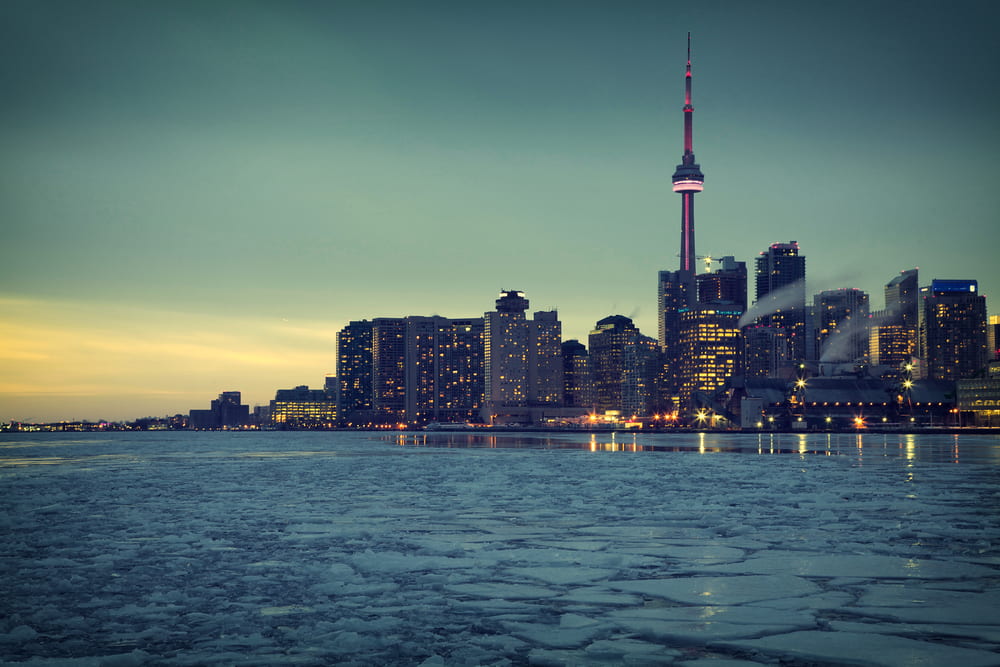 Sunset city skyline with cracked ice on the waterfront